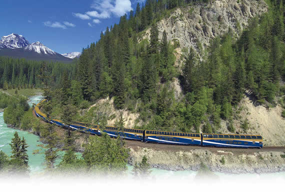 The train passing throughthe Canadian Rockies